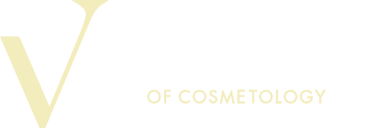 Vogue College of Cosmetology logo
